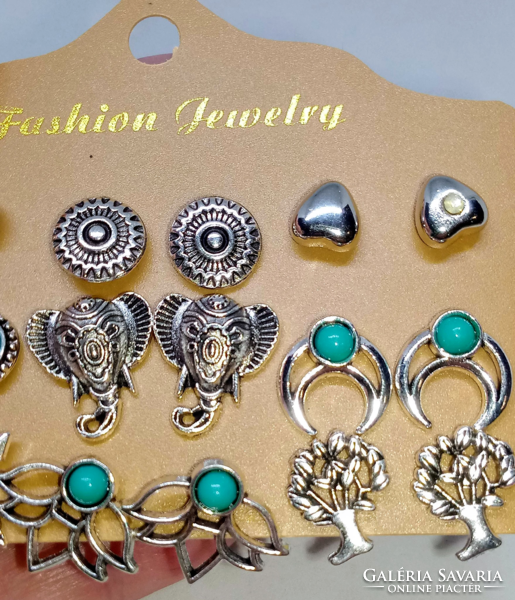 9 Pair of Tibetan silver earrings set, carved or with turquoise stones 107
