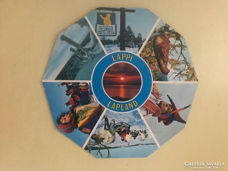 Circular, colored, foreign postcard. Mail is clear. A traveling memory. Available in souvenir shops. Lapland