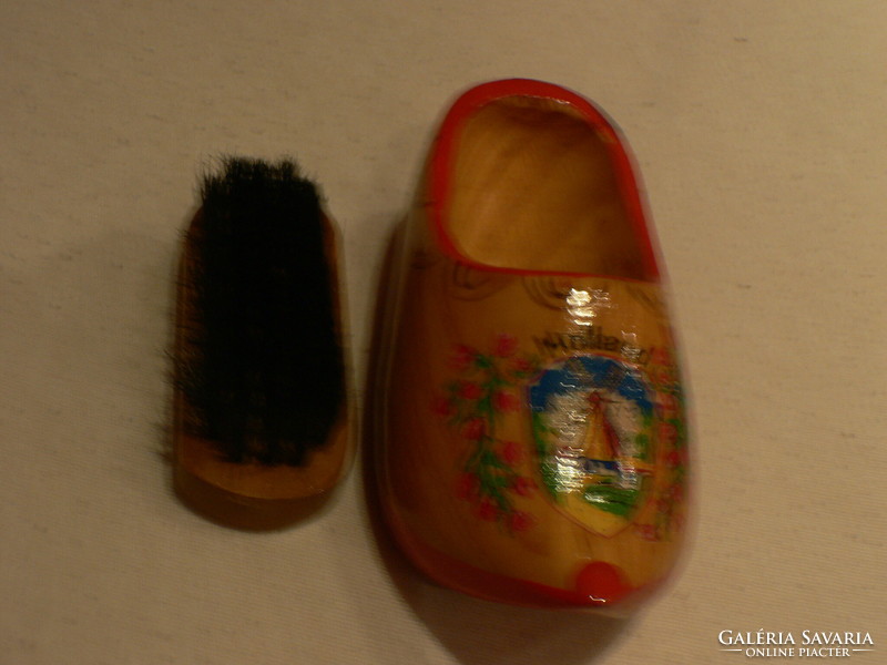 Dutch souvenir - painted wooden slippers with clothes cleaning brush