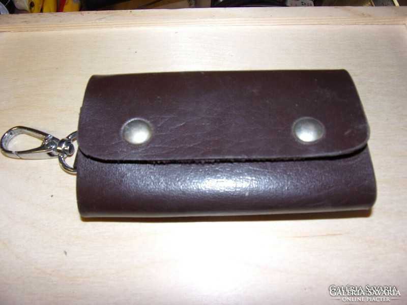 Can be attached to a leather keychain belt