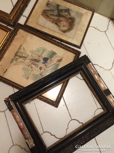 6 gilded picture frames look old, antique, retro, etc. with a few pictures