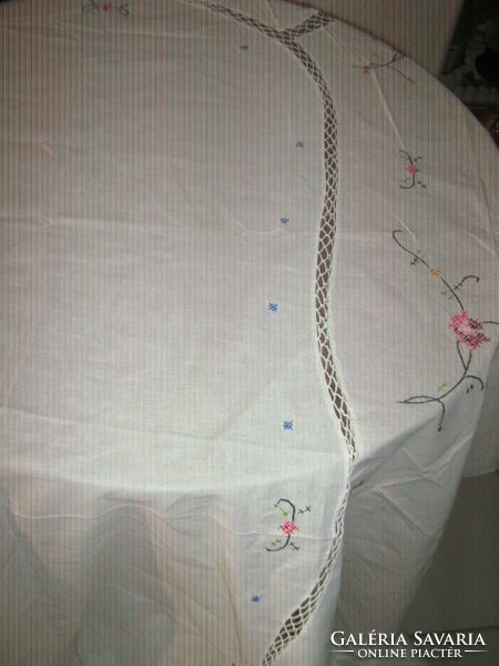A huge tablecloth with a beautiful embroidered lace insert