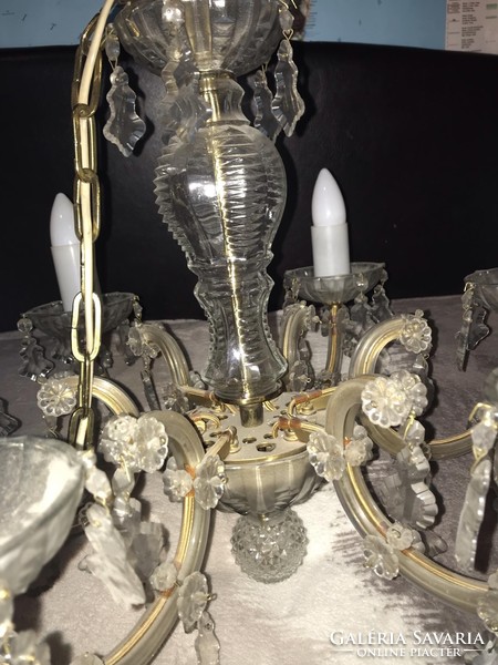 Maria Theresa-style crystal chandelier with accompanying wall arm