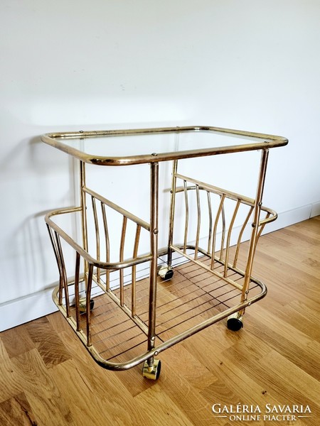 Rolling vintage table with newspaper compartment