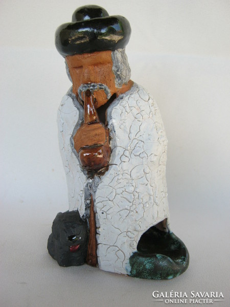 Pipe-smoking shepherd with Puli dog, Hungarian applied art ceramics