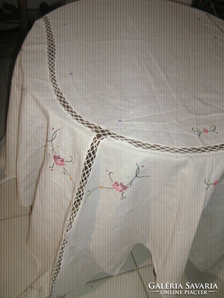 A huge tablecloth with a beautiful embroidered lace insert