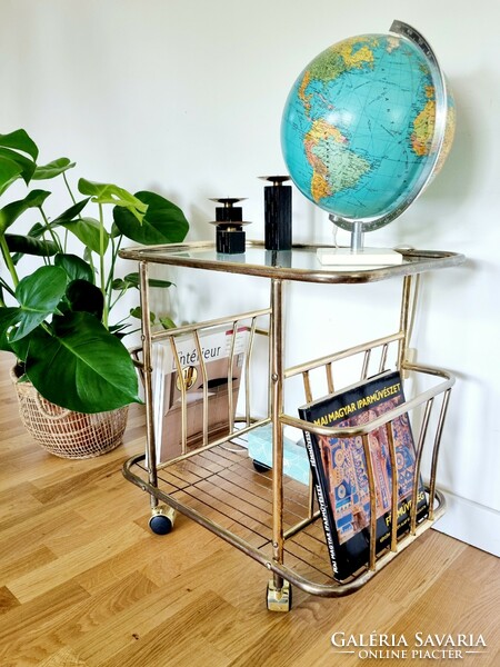 Rolling vintage table with newspaper compartment