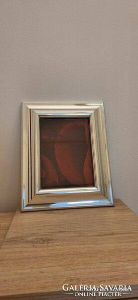 Silver-plated picture frame.