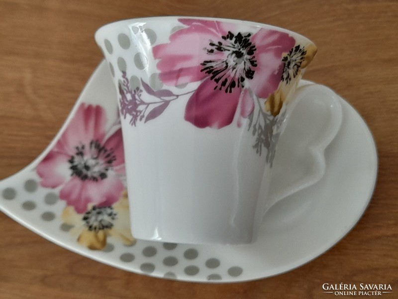 Porcelain cup with a special coaster