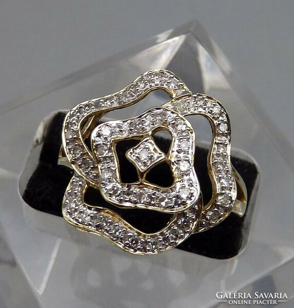 Rengeteg szikrázó  0.41ct gyémánttal 14 kr.arany gyűrű.Igazolással