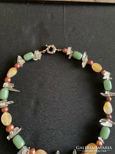 Custom-made necklace of many colors, made of various minerals. With a wide, quick-on lock.