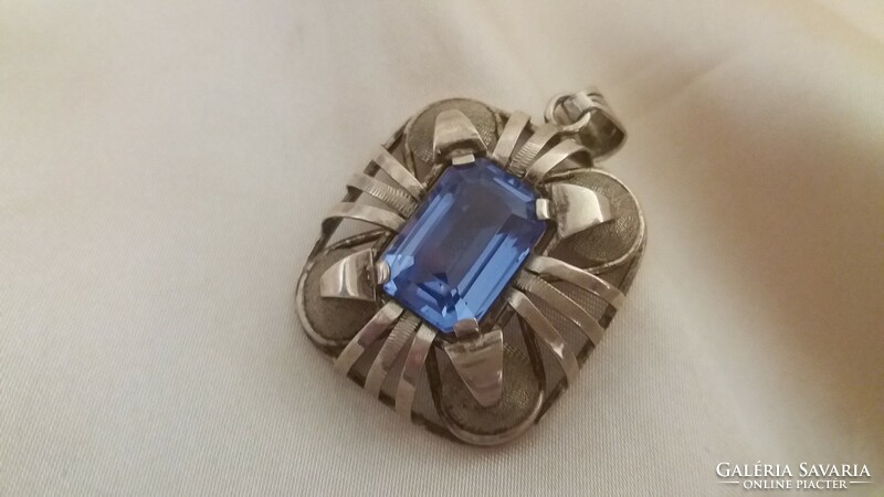 Antique silver pendant with topaz