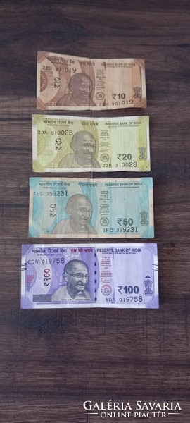 For sale, based on the pictures, 4 pieces of Indian paper money,