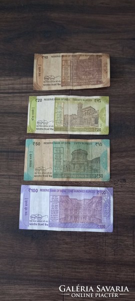 For sale, based on the pictures, 4 pieces of Indian paper money,