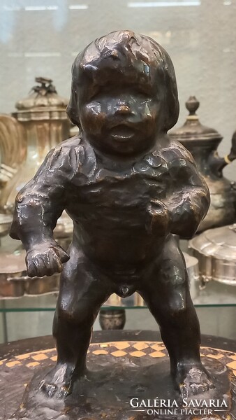 Antique bronze statue doll