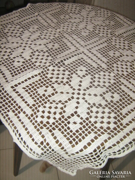 Beautiful hand-crocheted white tablecloth