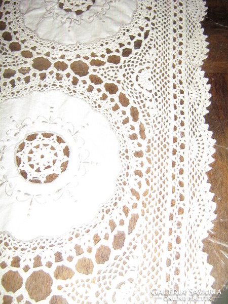 Beautiful hand-crocheted, embroidered antique tablecloth with Art Nouveau features