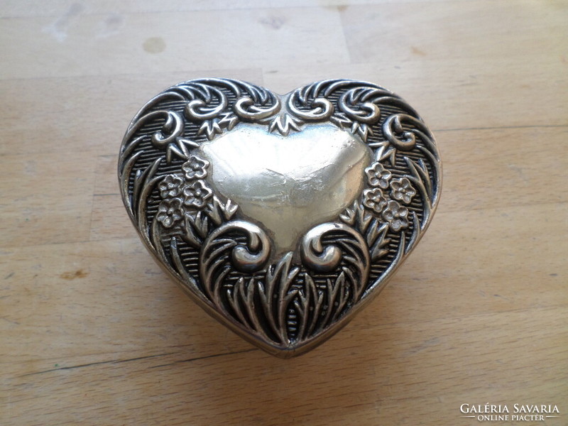 Heart-shaped glass jewelry holder with a decorative metal lid