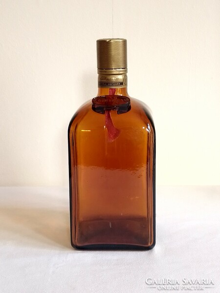 Old brown square cointreau drinking glass bottle flawless, retro era