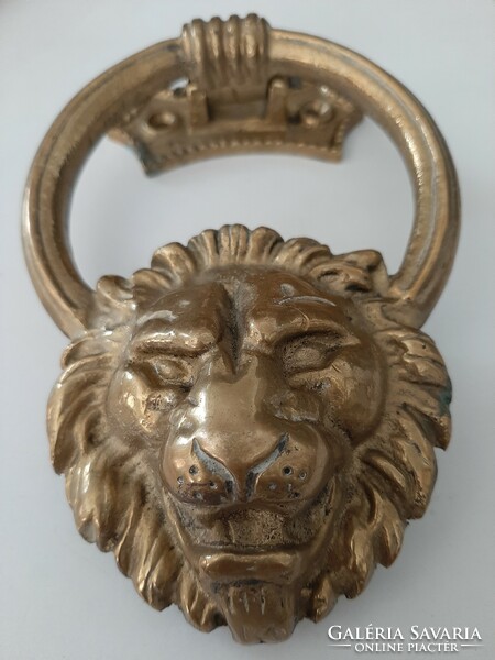 Solid copper knocker with a lion's head