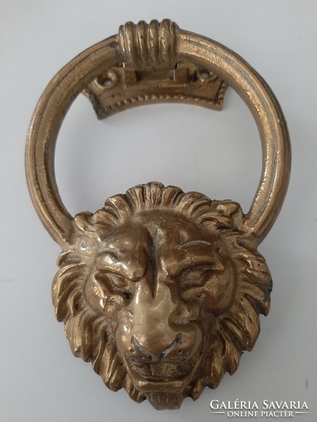 Solid copper knocker with a lion's head