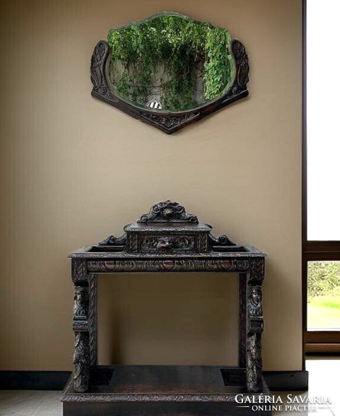 Antique Neo-Renaissance style console table with an excitingly shaped wall mirror
