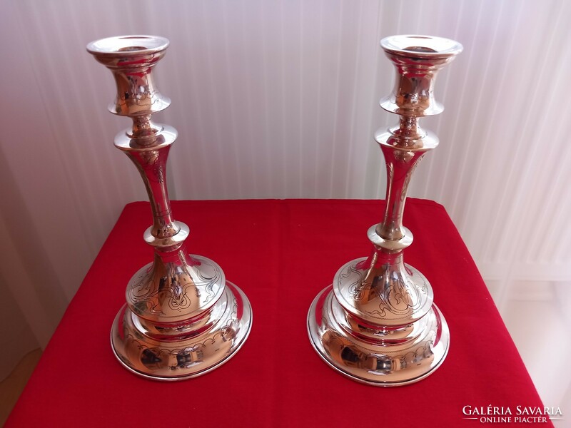 A curiosity! A pair of silver candlesticks, an excellent investment piece of art cc.1900