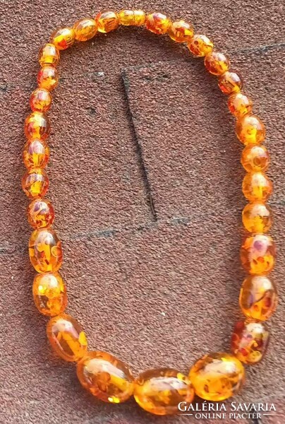 Huge yellow (amber?) looking necklace