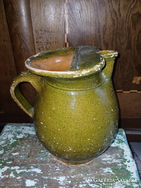 Old folk earthenware wine jug