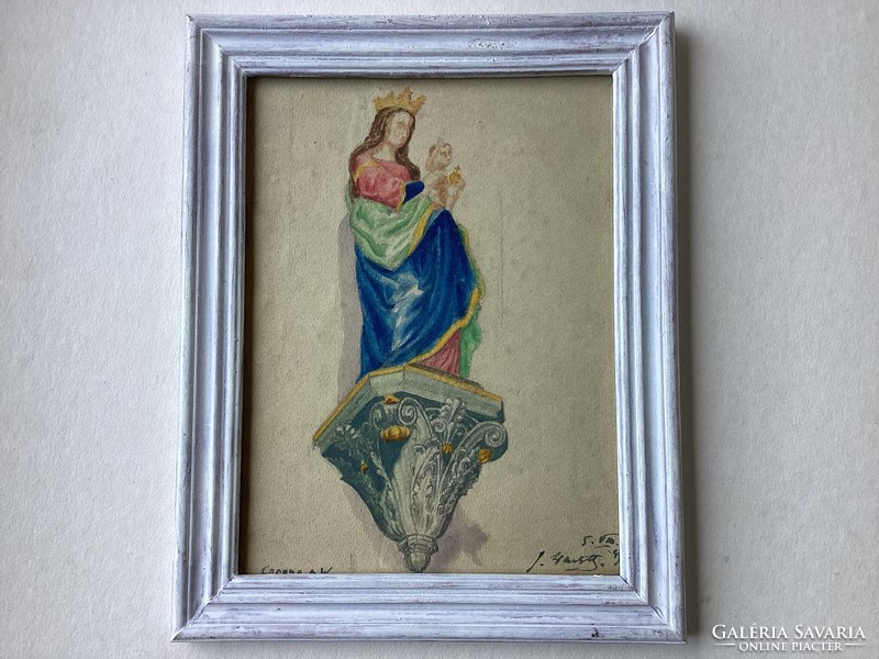 Virgin Mary with her baby, in a glass frame.
