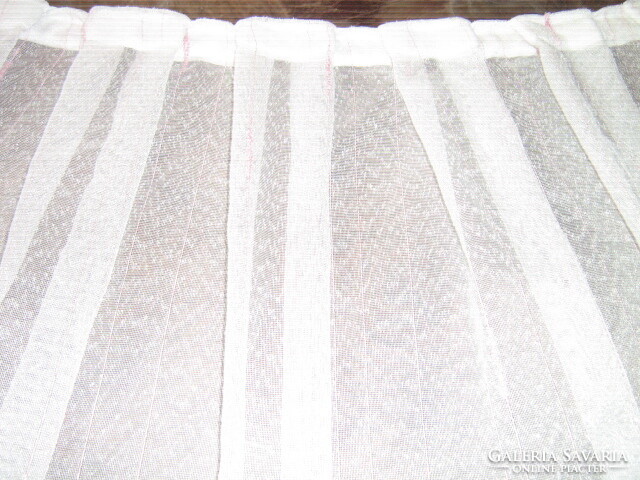 Beautiful pink curtain woven with silvery glittering thread