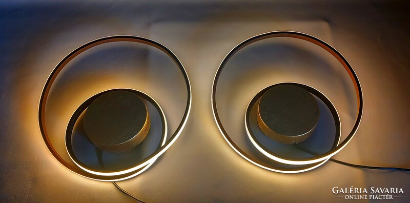 A pair of op-art design wall lamps is negotiable