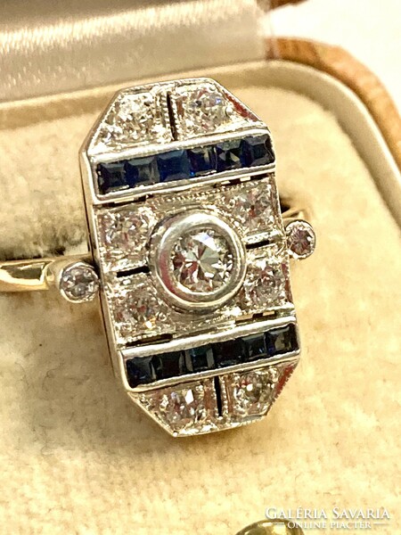 Women's ring with brilliant and sapphire.