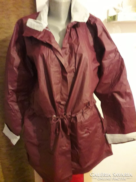 Avon brown patent pocket shrinkable raincoat jacket at the waist is brand new