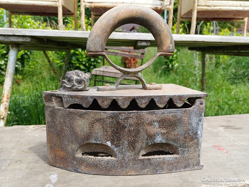 Old iron with lion's head