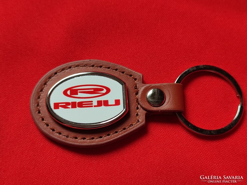 Rieju oval metal key ring on a leather base