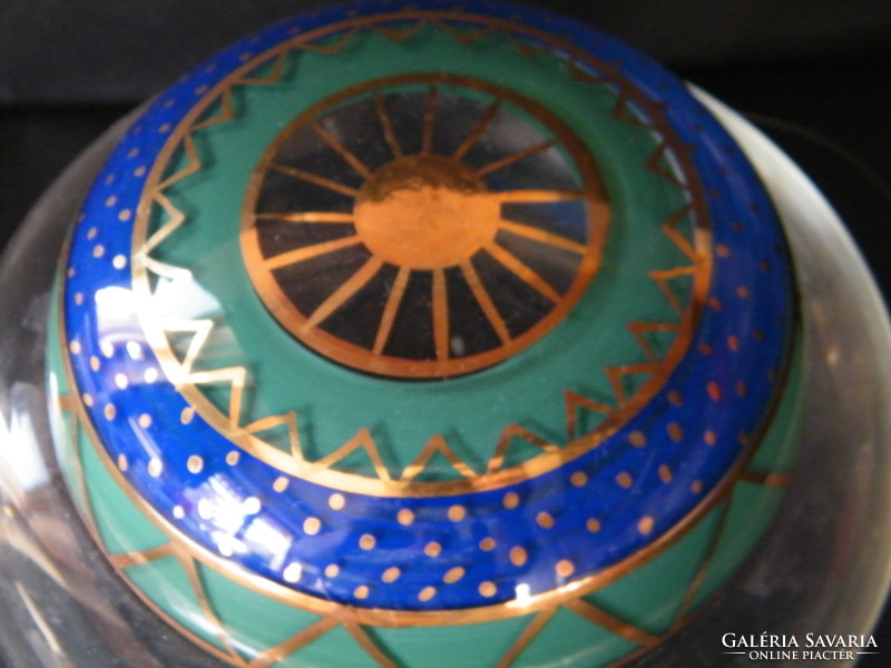 Very nice glass bowl with colorful top, middle of table