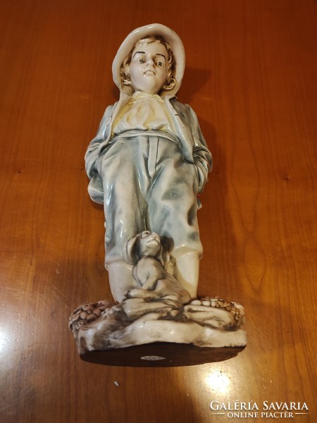 Boy with his dog plaster sculpture