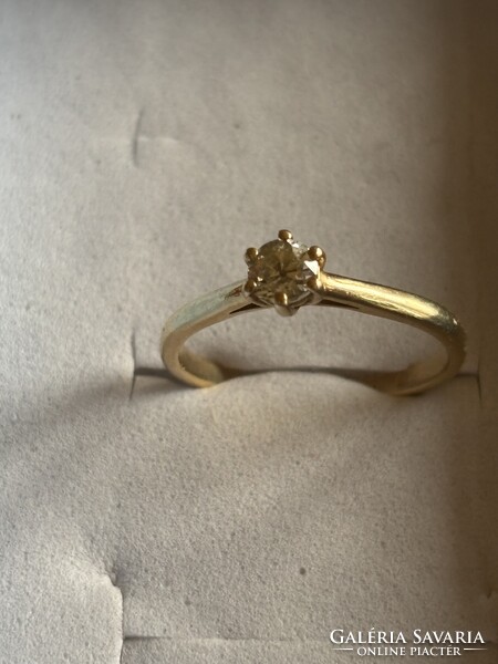 Új, sárga arany szoliter gyűrű 0,36 ct briliánssal