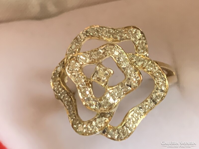 Rengeteg szikrázó  0.41ct gyémánttal 14 kr.arany gyűrű.Igazolással