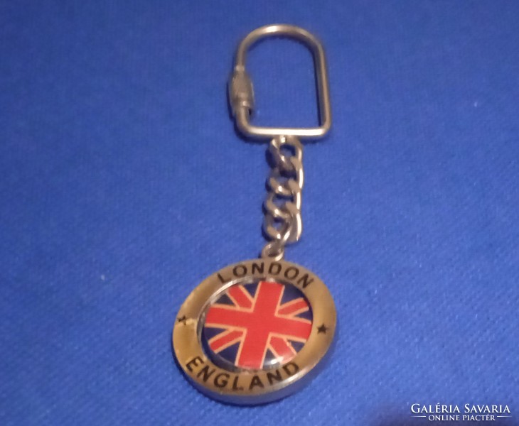 Key Chain from London England with British Flag on one side and QE2 on the otherside