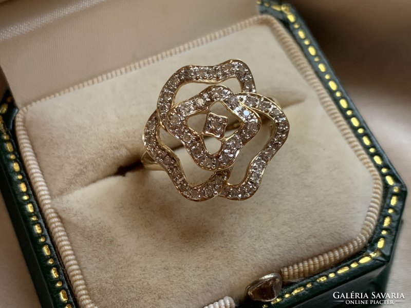 Rengeteg szikrázó  0.41ct gyémánttal 14 kr.arany gyűrű.Igazolással