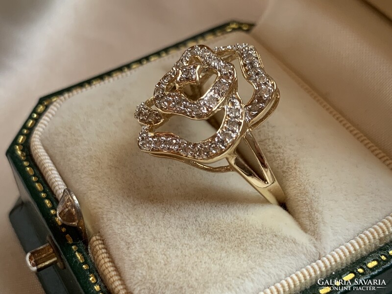 Rengeteg szikrázó  0.41ct gyémánttal 14 kr.arany gyűrű.Igazolással