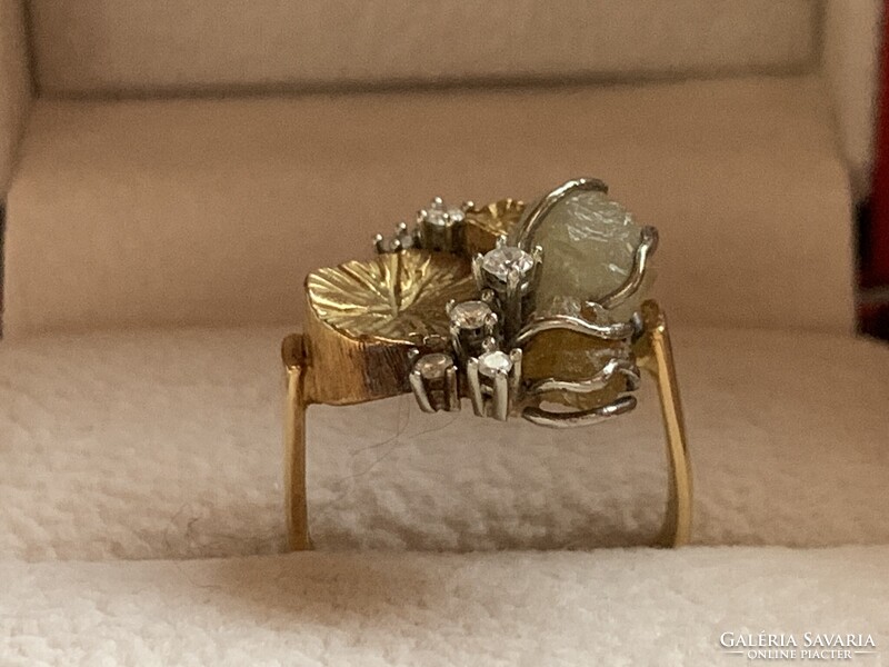 Modern ötvös 18.kr.arany gyűrűm gyémántokkal.Tanúsítvánnyal!