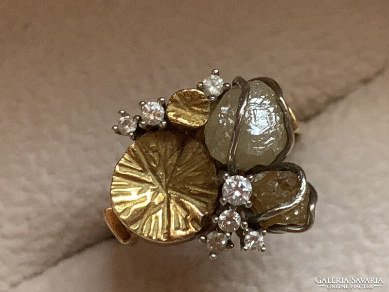 Modern ötvös 18.kr.arany gyűrűm gyémántokkal.Tanúsítvánnyal!