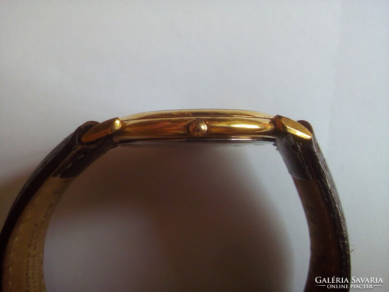 Maurice Lacroix watch with leather strap