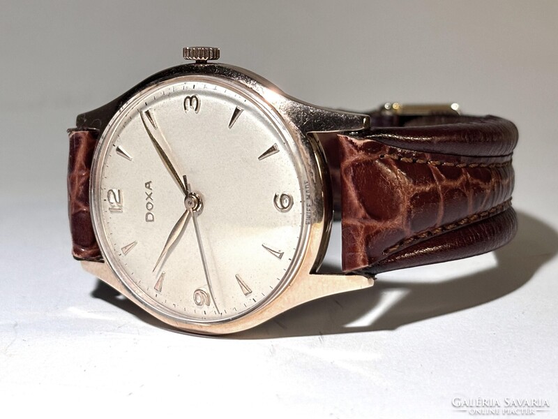 Gyűjteményből hibátlan Arany 14 K Doxa, gyári doboz, Hírsh szíj pontos 36 mm k.n. netto 8.5 gr arany