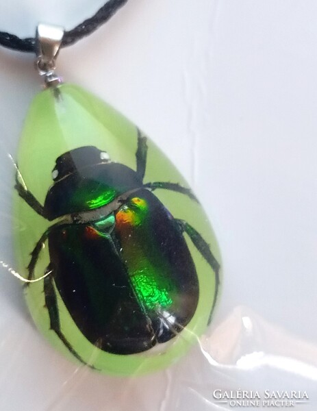 Real Rose Bug (lights up in the dark) adjustable necklace which is new