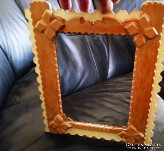 Old retro mirror with wooden frame