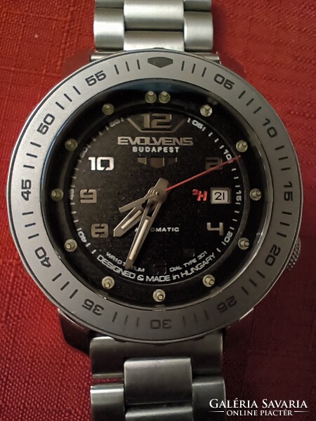 Evolvens egyedi autómata óra